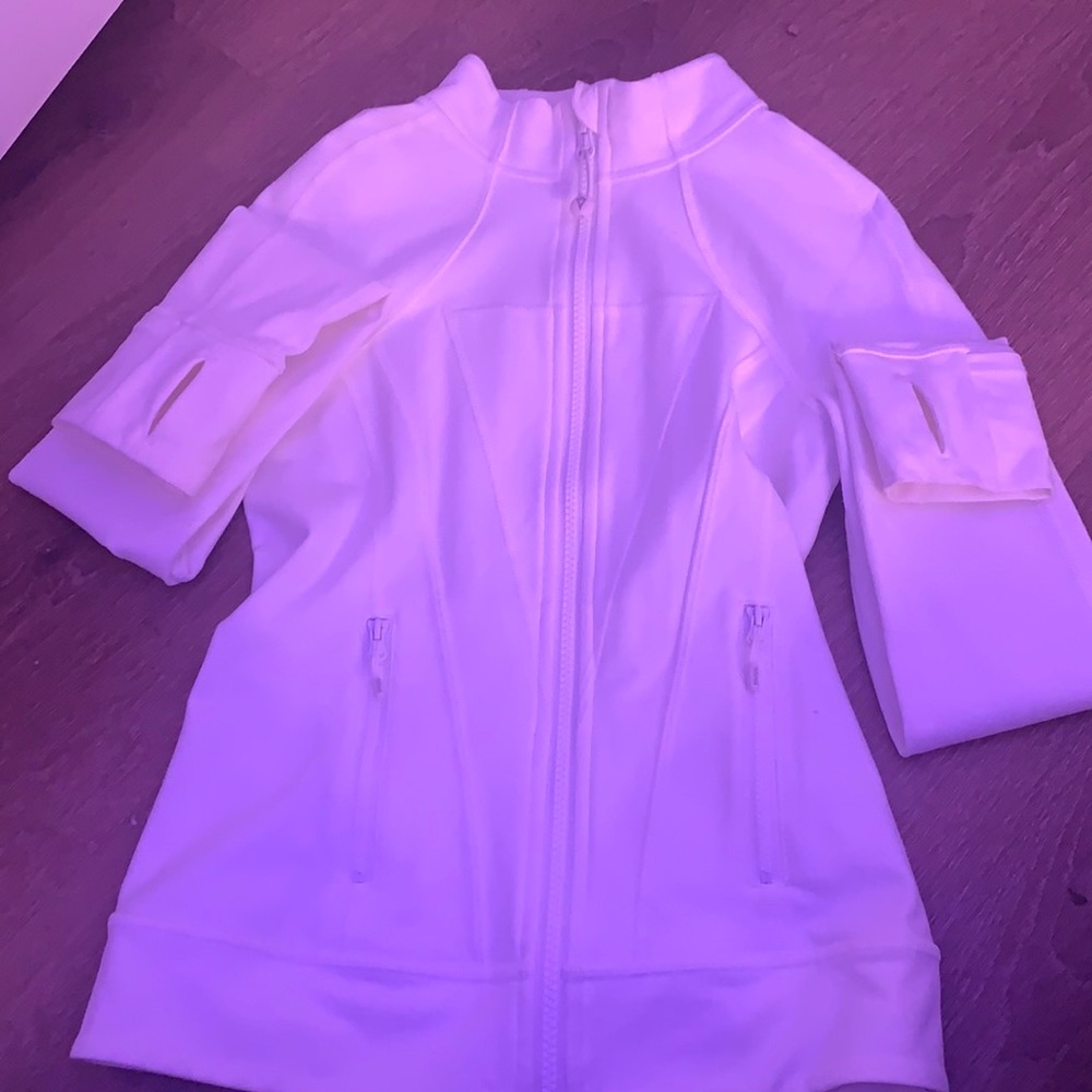 Ivivva white jacket with no stains.